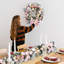 Couronne de Noël 24 pouces avec nœud rose, décorations de Noël artificielles aiguilles de pin givré avec lumières DEL, rose
