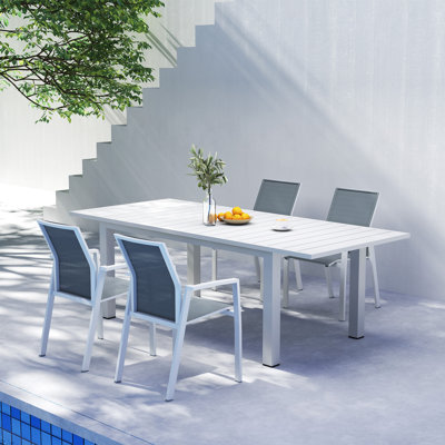 Calliana Patio Dining Set with Extendable Dining Table and Fully Assembled Stackable Chairs