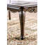 Table basse de style traditionnel avec pieds incurvés, design sculpté, structure en bois massif, finition Java