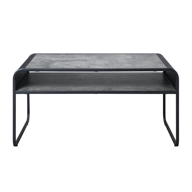 Table basse en béton gris et noir pour le salon avec structure en métal robuste