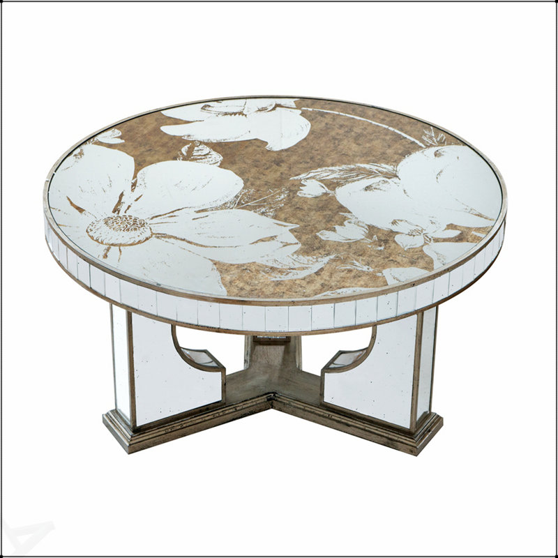 Table basse ronde de 35,5 x 35,5 x 19 pouces avec un élégant motif floral et une finition argentée en miroir, parfaite pour un décor moderne et classique.