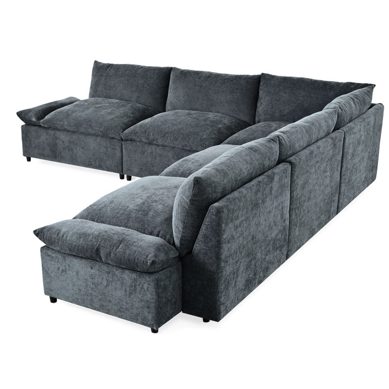 Salon moderne gris foncé avec sièges et rangement dissimulé