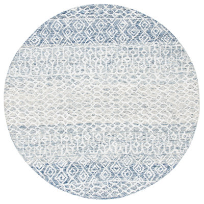 Tapis ivoire / bleu en laine / viscose / coton touffeté à la main Deveraux
