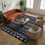 Tapis à motif géométrique noir Thambiah-855386709