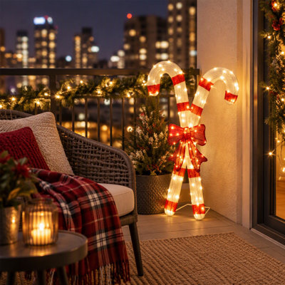 Décoration de Noël pré-éclairée en forme de canne de bonbon et d'arc rouge avec lumières DEL blanc chaud