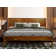 Structure de lit en bois massif Kalleen avec tête de lit à motif artistique