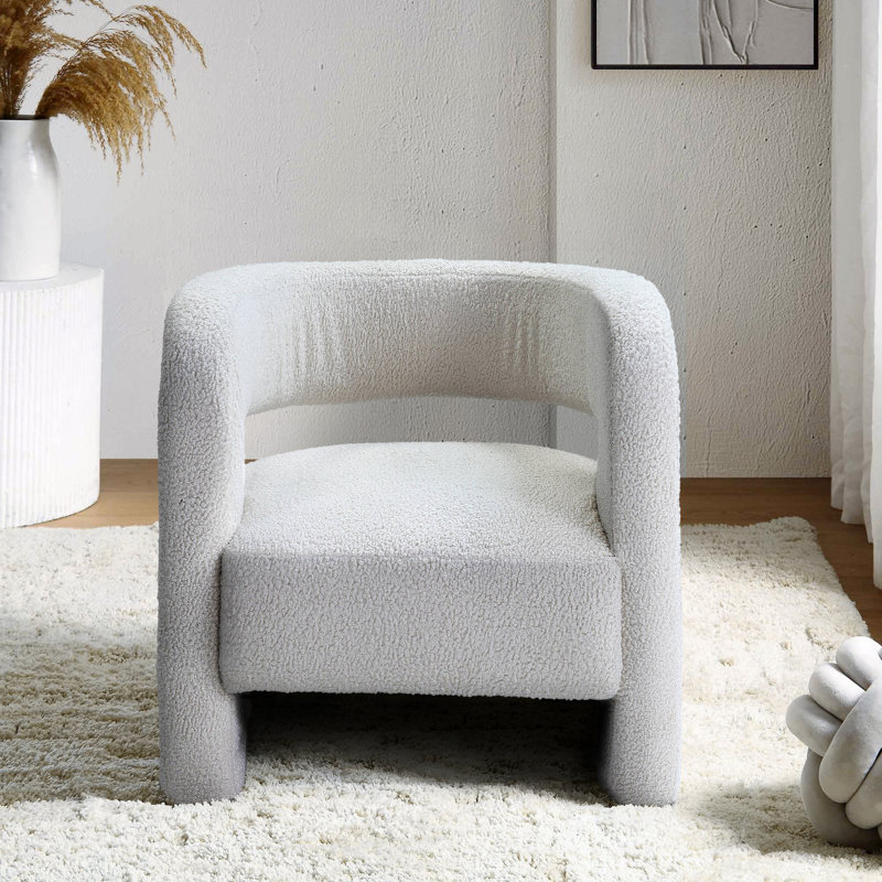 Fauteuil demi-tonneau rembourré Fynnlay