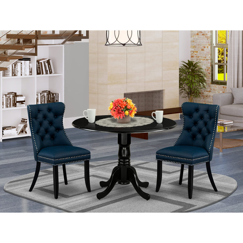 L'ensemble de meubles de salle à manger 3 pièces comprend une table de cuisine ronde avec des feuilles décoratives et 2 chaises rembourrées en tissu de polyester, 42 po x 42 po, noir