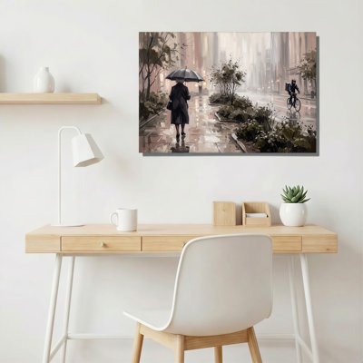 Art mural sur toile personne avec parapluie et cycliste sur une ville humide