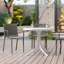 Ensemble de 4 chaises longues en polypropylène toutes saisons empilables gris chaud pour une utilisation au bord de la piscine, au jardin, au restaurant et à l'intérieur-129434987