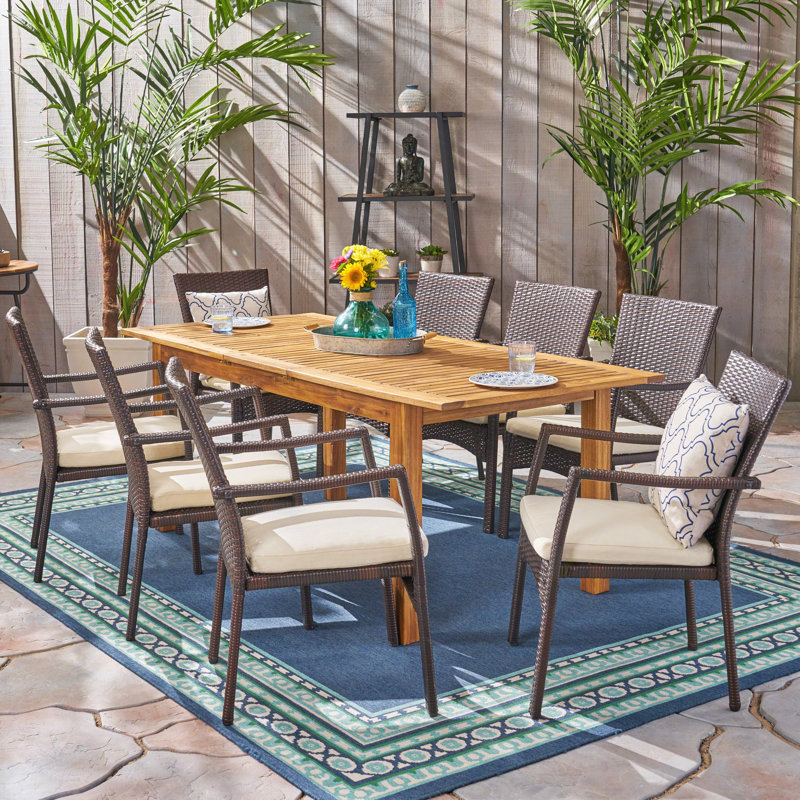 8 - Person Acacia Patio Dining Set with Extendable Rectangular Table , Cushions Included, Multi Brown Frame / Creme Cushion