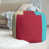 Beige / rouge / bleu sarcelle