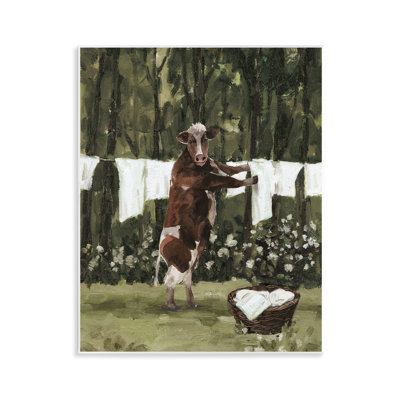 Vache faisant la lessive, art mural par échelle blanche