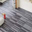 15.2cm W x 91.5cm L x 0.2cm Laminate Flooring