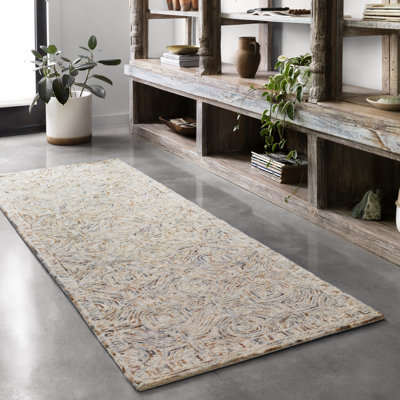 Tapis ivoire en laine touffeté à la main Haubert