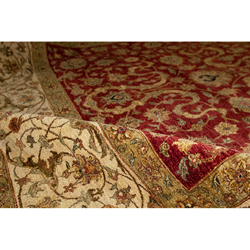 Tapis rouge et ivoire noué à la main de haute qualité