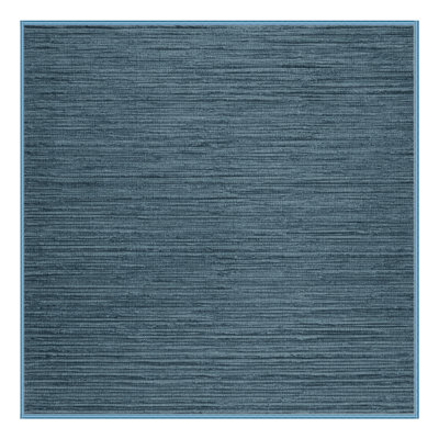 Tapis bleu uni lavable à la machine