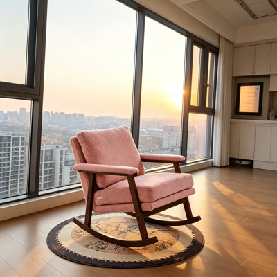 Fauteuil à bascule rose pâle de style moderne du milieu du siècle, avec structure en bois massif et revêtement en tissu effet peluche, fauteuil de lecture capitonné pour le salon