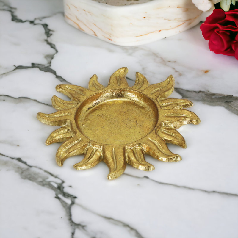Décor soleil en fonte