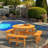Lanisha 8 - Person Wood Patio Dining Set with Round Table