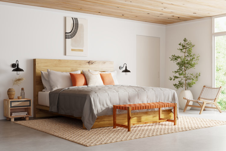 organic modern bedroom with jute area rug and simple wooden bed frame