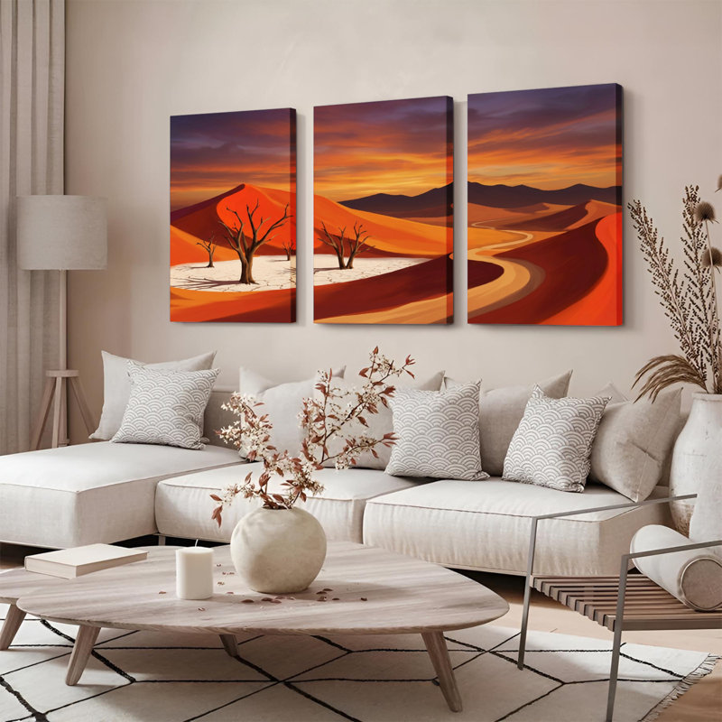 Ensemble de 3 tableaux sur toile représentant un paysage désertique avec dunes et arbres dénudés., 1218
