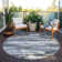 Aleighna Area Rug with Non-Slip Backing