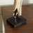 Harly Cream Polystone Standing African Woman Sculpture with Red Water Pots and Black Base, 2 Assorted 16"H, 4"W