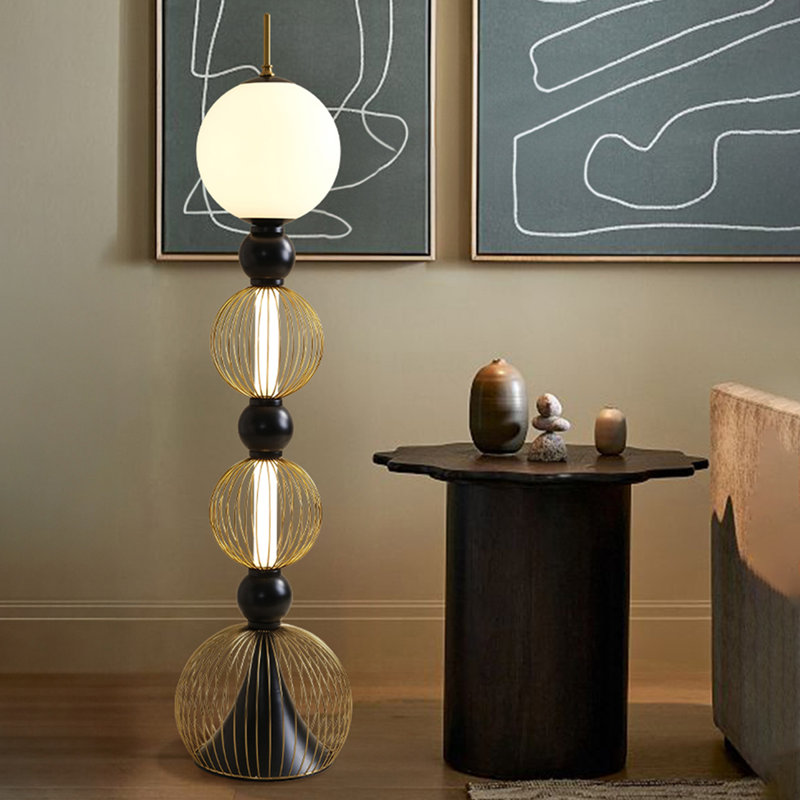 Métaux noirs + lampes sur pied de forme libre en verre