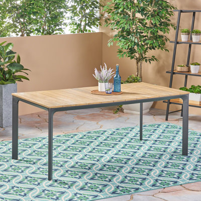 Amini Wooden Dining Table Mix and match with other dining sets or create a whole new set with this table