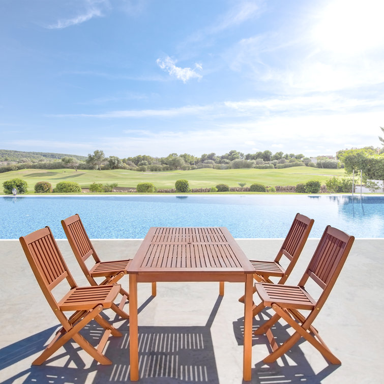 Stuckey Wood Patio Dining Set With Folding Chairs