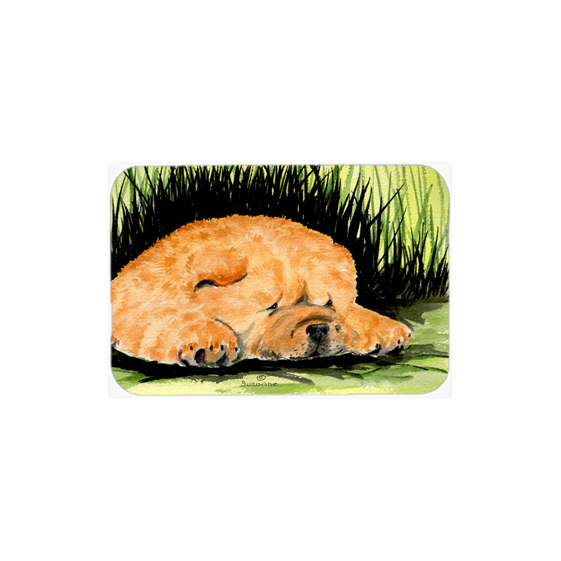 Chow-chow brun et planche à découper en verre vert