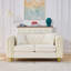 Causeuse Chesterfield en velours moelleux