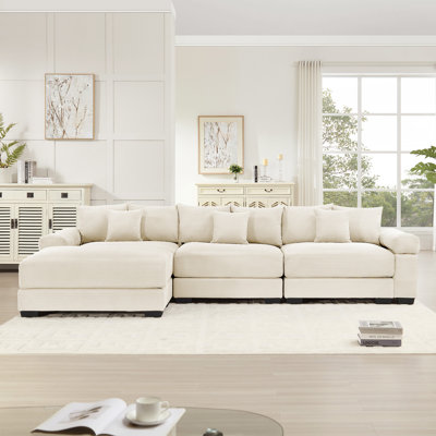 130"  Oversized Cloud Modular L-Shape Sectional Couch, Soft Corduroy Fabric,With An Ottoman,Deep Seat Wide Armrest Ergonomic Design 9 Pillows Easy Assembly,For Living Rooms Bedroom,Cream