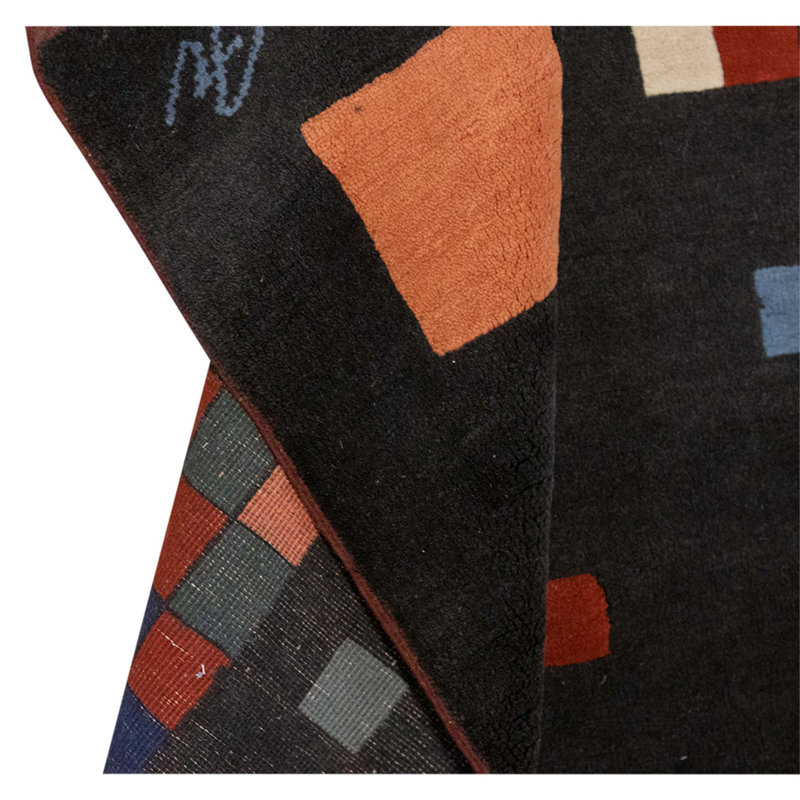 Tapis noir noué à la main de haute qualité