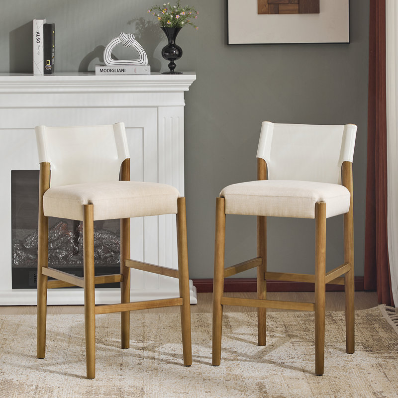 Ensemble de tabourets de bar en tissu noir d'inspiration Mid-Century, siège rembourré confortable avec structure en bois d'hévéa robuste pour une décoration intérieure élégante.
