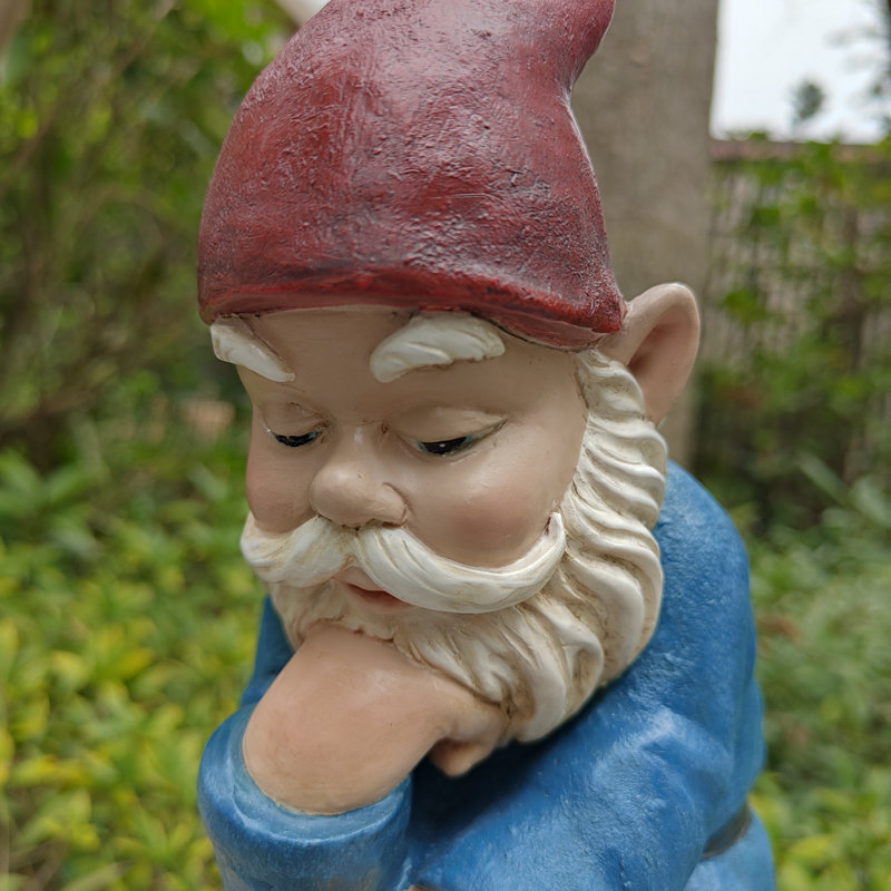 Figurine musquée bleue: gnome pensif en polyrésine