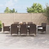 Dannicka 8 - Person Wicker Patio Dining Set with Rectangular Table , Cushions Included