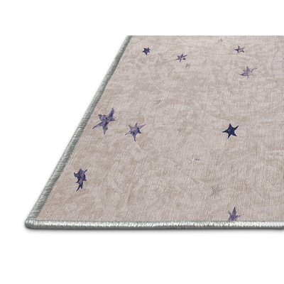 Tapis beige lavable à la machine