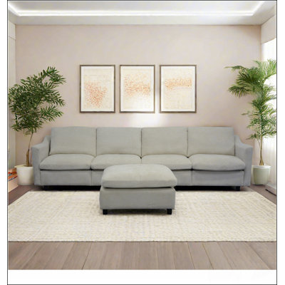 4 - Seater Modern Beige Fabric Modular Cloud Sofa with Ottoman Armrest Pockets 4 Pillows Minimalist