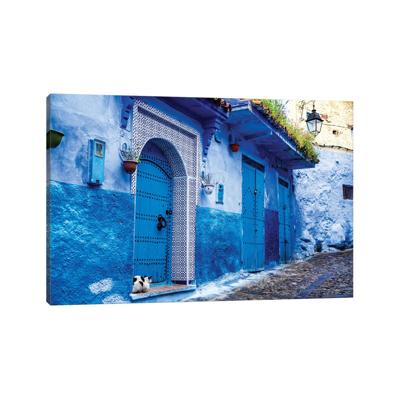 Chefchaouen, Morocco. Cat And Blue Door And Buildings by Dane Shue - Print on Canvas, Wrapped Canvas