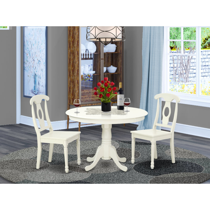 L'ensemble de mobilier de salle à manger 3 pièces comprend une table ronde avec piédestal et 2 chaises en bois, noir et cerise