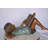 Kid On A Pillow Reading A Book Bronze Statue - Size: 32"L X 13"W X 12"H.