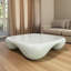Table basse moderne en faux travertin textu pour salon / bureau-937177782