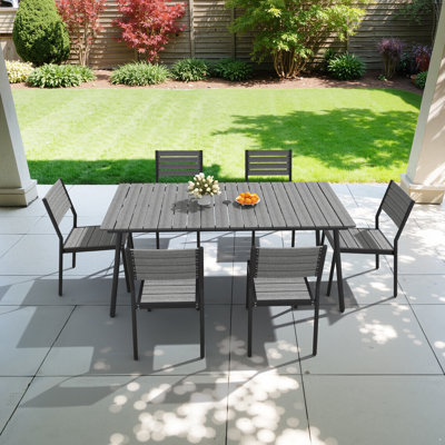 6-Person Aluminum Outdoor Dining Set With Umbrella Hole And Stackable Chairs