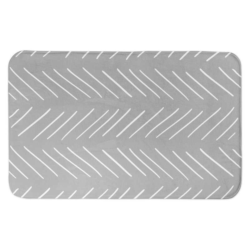 Tapis pour salle de bain à chevrons modern Emerico, Noir / Blanc