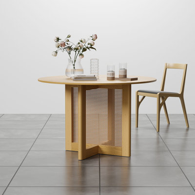 Table de salle à manger ronde en bois massif avec piédestal en rotin