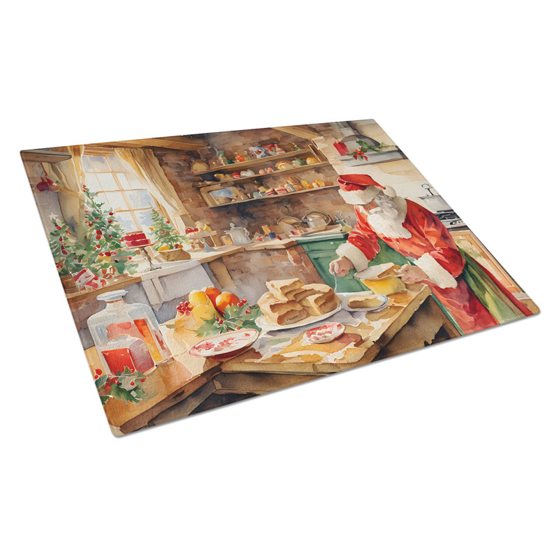 Planche à découper en forme de biscuits avec père Noël