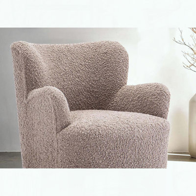 Fauteuil d'appoint à dossier courbé, accoudoirs inclinés et pieds en boule