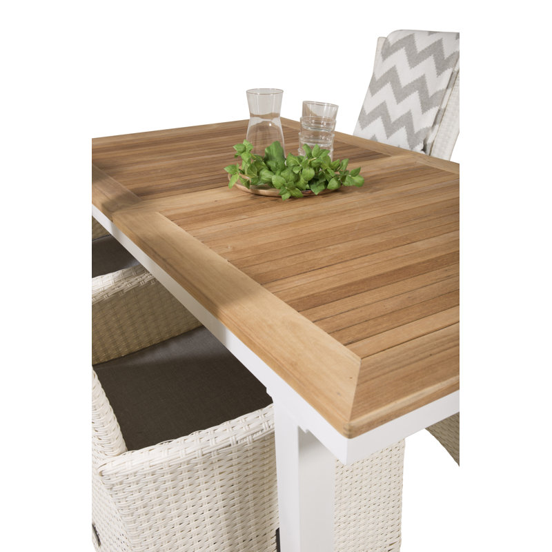 Navya 4 - Person Patio Dining Set with Extendable Rectangular Table , Cushions Included, 75cm H x 152cm W x 90cm L
